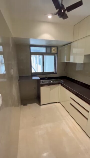 Kitchen in 2 BHK Apartment at Chandak Cornerstone, Worli – for Rent