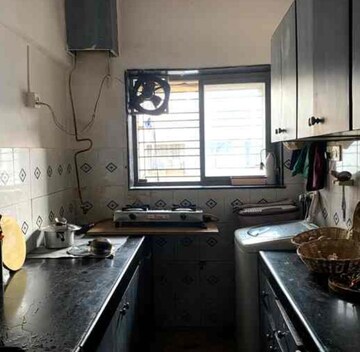 Kitchen in 2 BHK Apartment at Adarsh CHS Oshiwara, Oshiwara – for Rent
