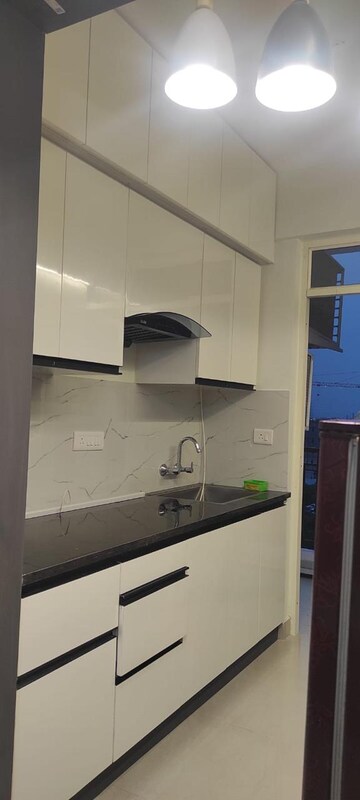 Kitchen in 2 BHK Apartment at Suncity Avenue 76, Sector 76 – for Rent