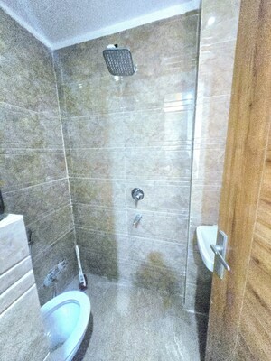 Bathroom in 2 BHK Builder Floor at Chattarpur – for Rent