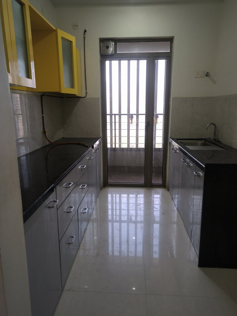 Kitchen, kalpataru-paramount 2 Bedroom 711 Sq.Ft. Apartment In Kapur Bawdi Thane 9245316