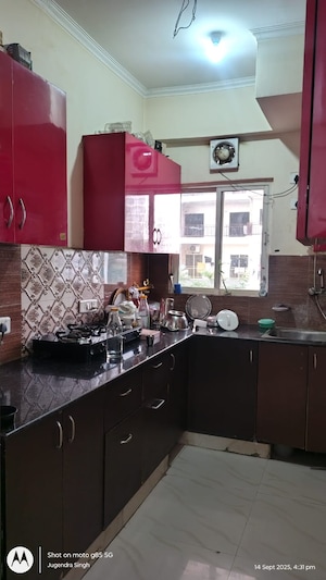 Kitchen in 2.5 BHK Apartment at Aims Golf City, Sector 75 – for Rent