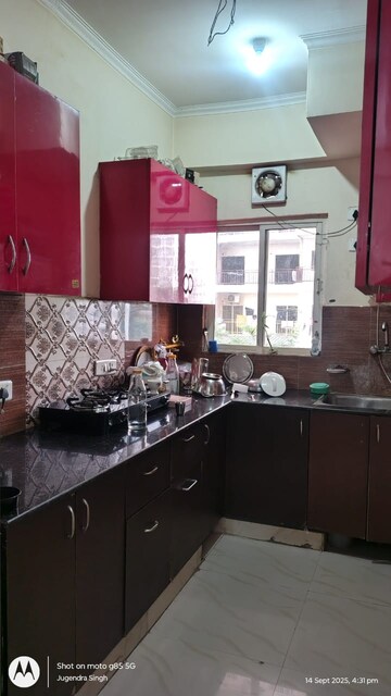 Kitchen in 2.5 BHK Apartment at Aims Golf City, Sector 75 – for Rent