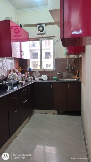 Kitchen in 2.5 BHK Apartment at Aims Golf City, Sector 75 – for Rent
