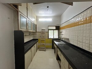 Kitchen in 3 BHK Apartment at Harmony Sky Suites, Ghodbunder Road – for Sale