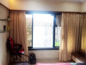 Living Room in 2 BHK Apartment at Khar West – for Sale