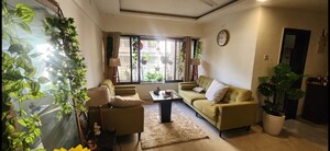 Living Room in 2 BHK Apartment at Grenville CHS, Andheri West – for Rent