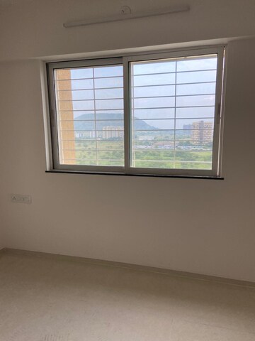 Room in 2 BHK Apartment at Pride World City Long Island, Charholi Budruk – for Sale