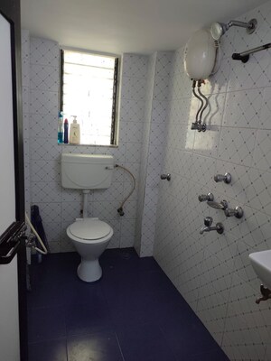 Bathroom in 3 BHK Apartment at Silver Nook CHS, Santacruz East – for Rent