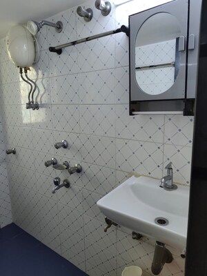 Bathroom in 3 BHK Apartment at Silver Nook CHS, Santacruz East – for Rent