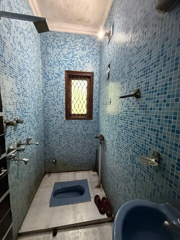 Bathroom in 2 BHK Apartment at Paschim Vihar – for Rent