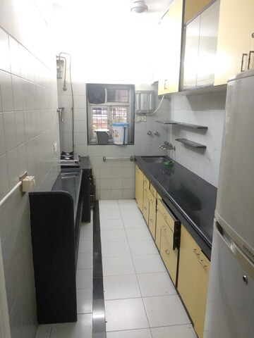 Kitchen in 2 BHK Apartment at Arvasu Chs Ltd, Santacruz West – for Rent