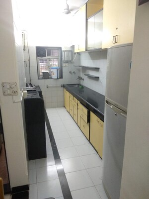Kitchen in 2 BHK Apartment at Arvasu Chs Ltd, Santacruz West – for Rent