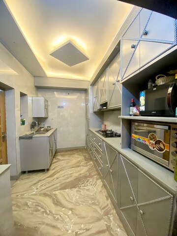 Kitchen in 5 BHK Builder Floor at Ashoka Enclave – for Sale
