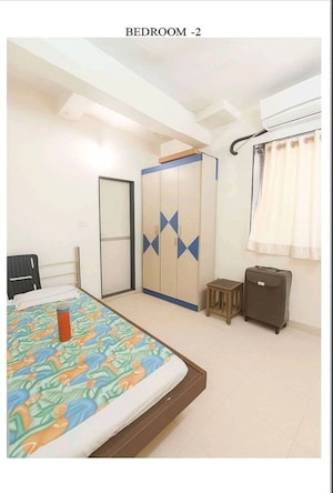 Bedroom in 2 BHK Apartment at Shri Ramakrishna CHS, Vile Parle West – for Rent