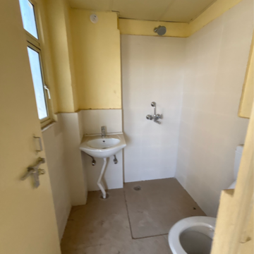 Bathroom in 2 BHK Apartment at Auric Happy Homes, Sector 86 – for Sale