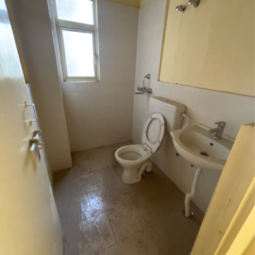 Bathroom in 2 BHK Apartment at Auric Happy Homes, Sector 86 – for Sale