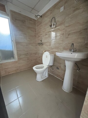 Bathroom in 2.5 BHK Apartment at Gaurs Green Vista, Nyay Khand – for Sale