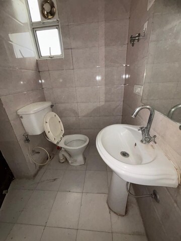 Bathroom in 2.5 BHK Apartment at Gaurs Green Vista, Nyay Khand – for Sale
