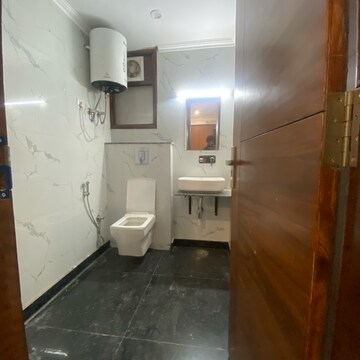 Bathroom in 2 BHK Builder Floor at Chattarpur – for Rent