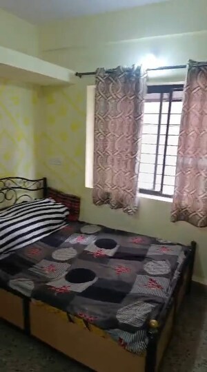 Bedroom in 1 RK Apartment at Dhankawadi – for Rent