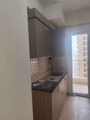 Kitchen in 3 BHK Apartment at Amrapali Crystal Homes, Sector 76 – for Rent