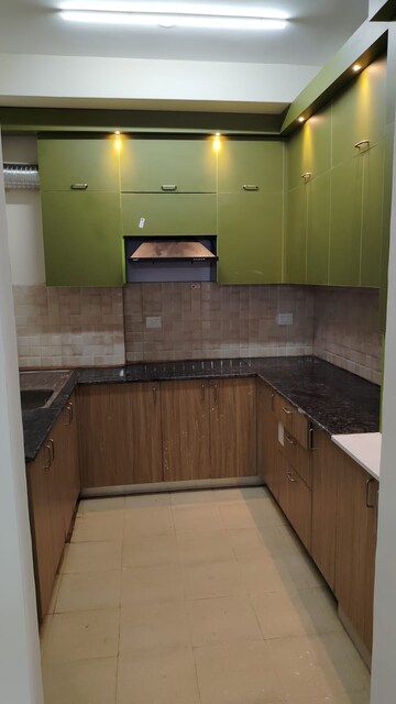 Kitchen in 3.5 BHK Apartment at Amrapali Crystal Homes, Sector 76 – for Rent