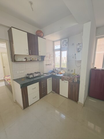 Kitchen in 1 BHK Apartment at Shree Vardhman Green Court, Sector 90 – for Rent