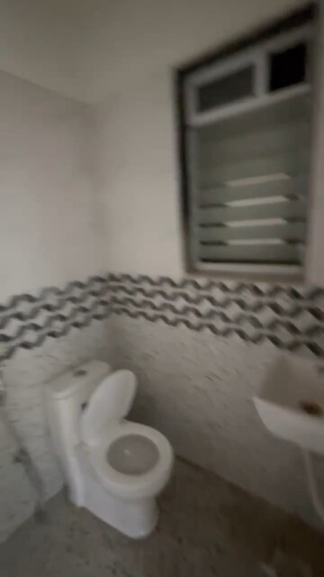 Bathroom in 1 BHK Apartment at Akash Deep Tower, Girgaon – for Rent