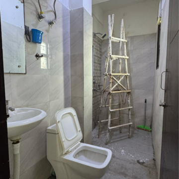 Bathroom in 1 BHK Builder Floor at Palm Residency Chhatarpur, Rajpur Khurd Extension – for Rent