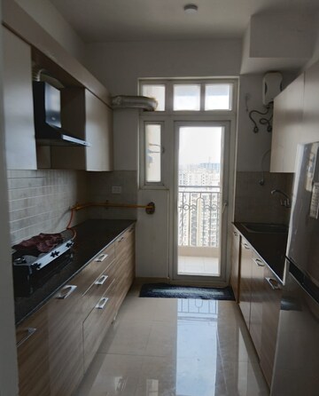 Kitchen in 3 BHK Apartment at ATS Nobility, Sector 4 Greater Noida – for Rent