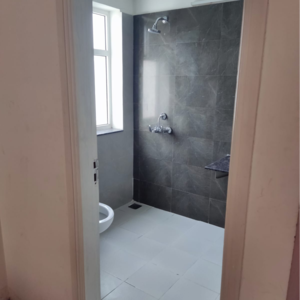 Bathroom in 3 BHK Apartment at International Airport Road – for Rent