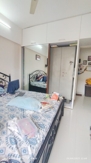 Master Bedroom in 3 BHK Apartment at Unique Poonam Estate Cluster 2, Mira Road – for Sale