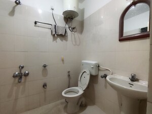 Bathroom in 2 BHK Apartment at Aishwarya Eastwoods, Hsr Layout – for Rent
