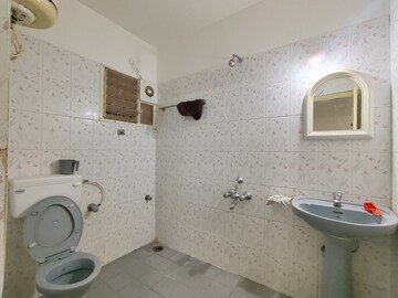 Bathroom in 2 BHK Apartment at Aishwarya Eastwoods, Hsr Layout – for Rent
