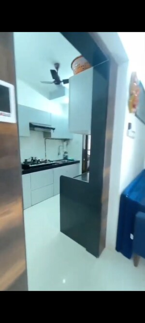 Kitchen in 2 BHK Apartment at Vinay Nagar CHS, Mira Road – for Sale