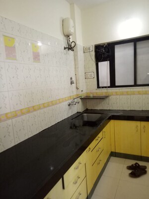 Kitchen in 3 BHK Apartment at Usha Swapna, Prabhat Road – for Rent