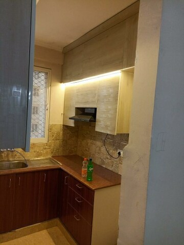 Kitchen in 2 BHK Apartment at Amrapali Golf Homes, Sector 4 Greater Noida – for Rent