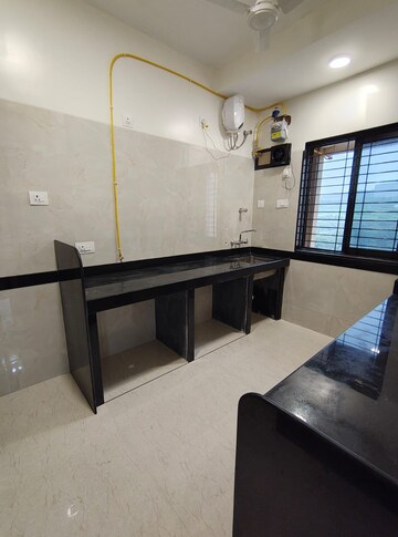 Kitchen in 2 BHK Apartment at K Raheja Heights, Malad East – for Rent