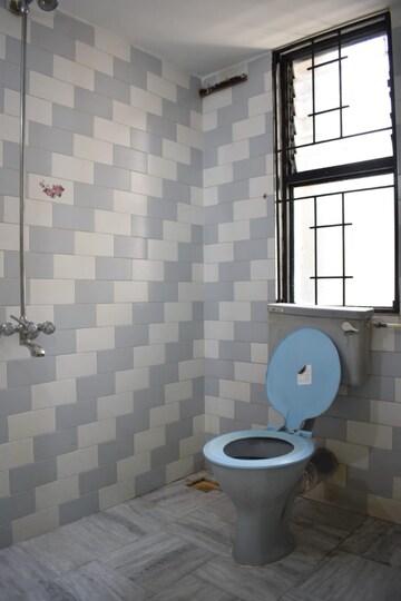 Bathroom in 2 BHK Apartment at Naiknavare Sylvan Heights, Aundh – for Rent