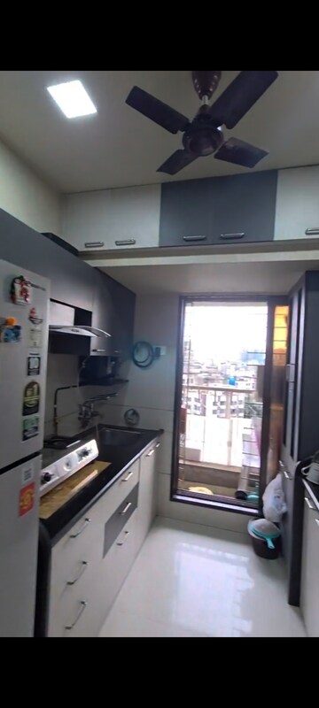 Kitchen in 2 BHK Apartment at Ramdev Park, Mira Road – for Sale