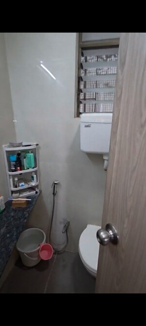Bathroom in 2 BHK Apartment at Ramdev Park, Mira Road – for Sale