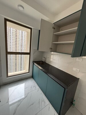 Kitchen in 1 BHK Apartment at Raymond Ten X Habitat, Pokhran Road No Two – for Rent