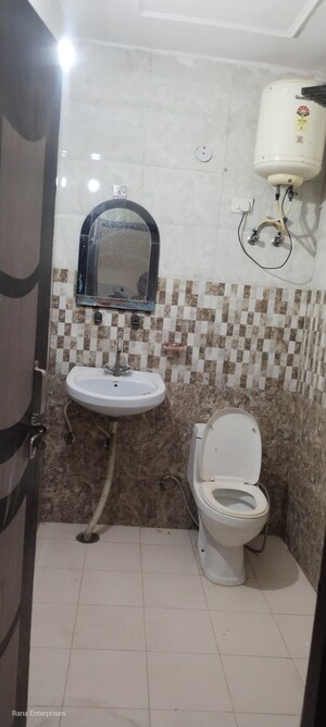 Bathroom in 2 BHK Builder Floor at Ansal Palam Triangle, Palam Vihar Extension – for Rent