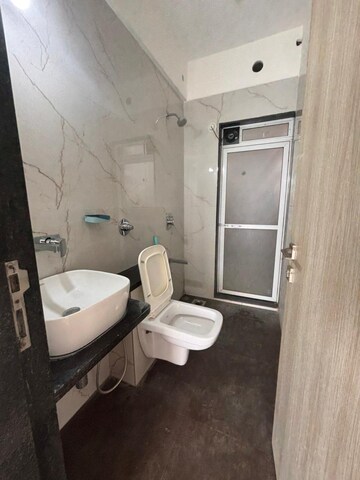 Bathroom in 3 BHK Apartment at Tricity Eros, Kharghar – for Rent