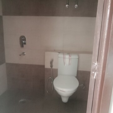 Bathroom in 4 BHK Apartment at Cosmos Express 99, Sector 99 – for Sale