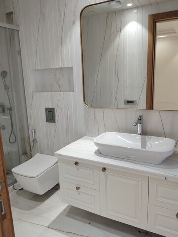 Bathroom in 4 BHK Builder Floor at Defence Colony – for Rent