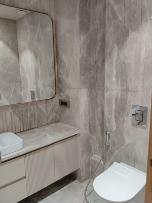 Bathroom in 4 BHK Builder Floor at Defence Colony – for Rent