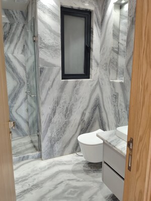 Bathroom in 4 BHK Builder Floor at Defence Colony – for Rent