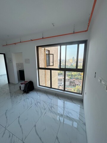 Living Room in 1 BHK Apartment at Raymond Realty Phase II, Pokhran Road No Two – for Rent